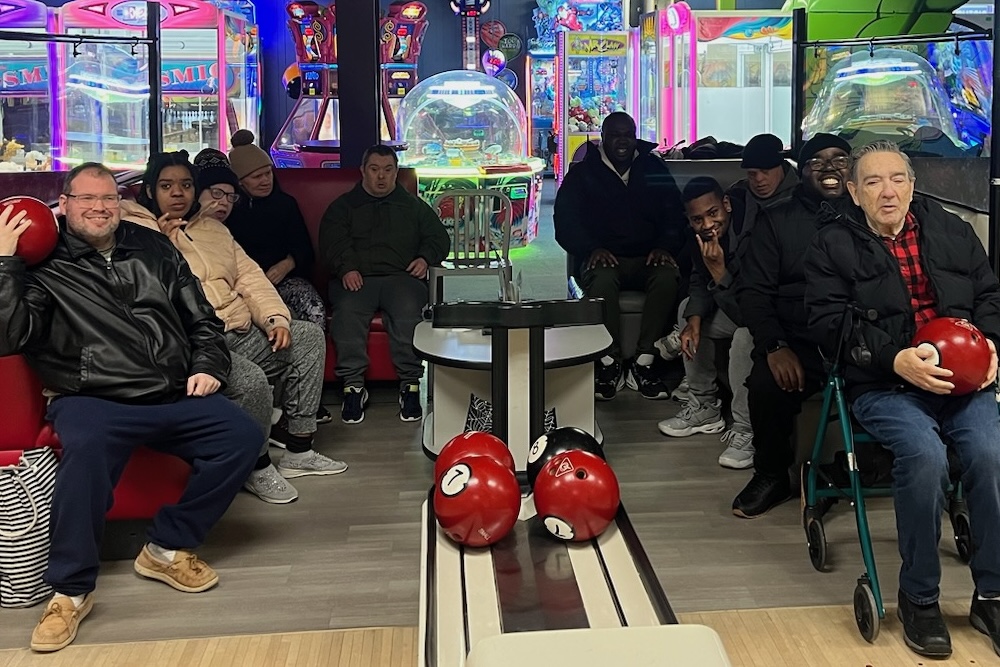 A group of our Day Hab participants enjoy a bowling outing together!